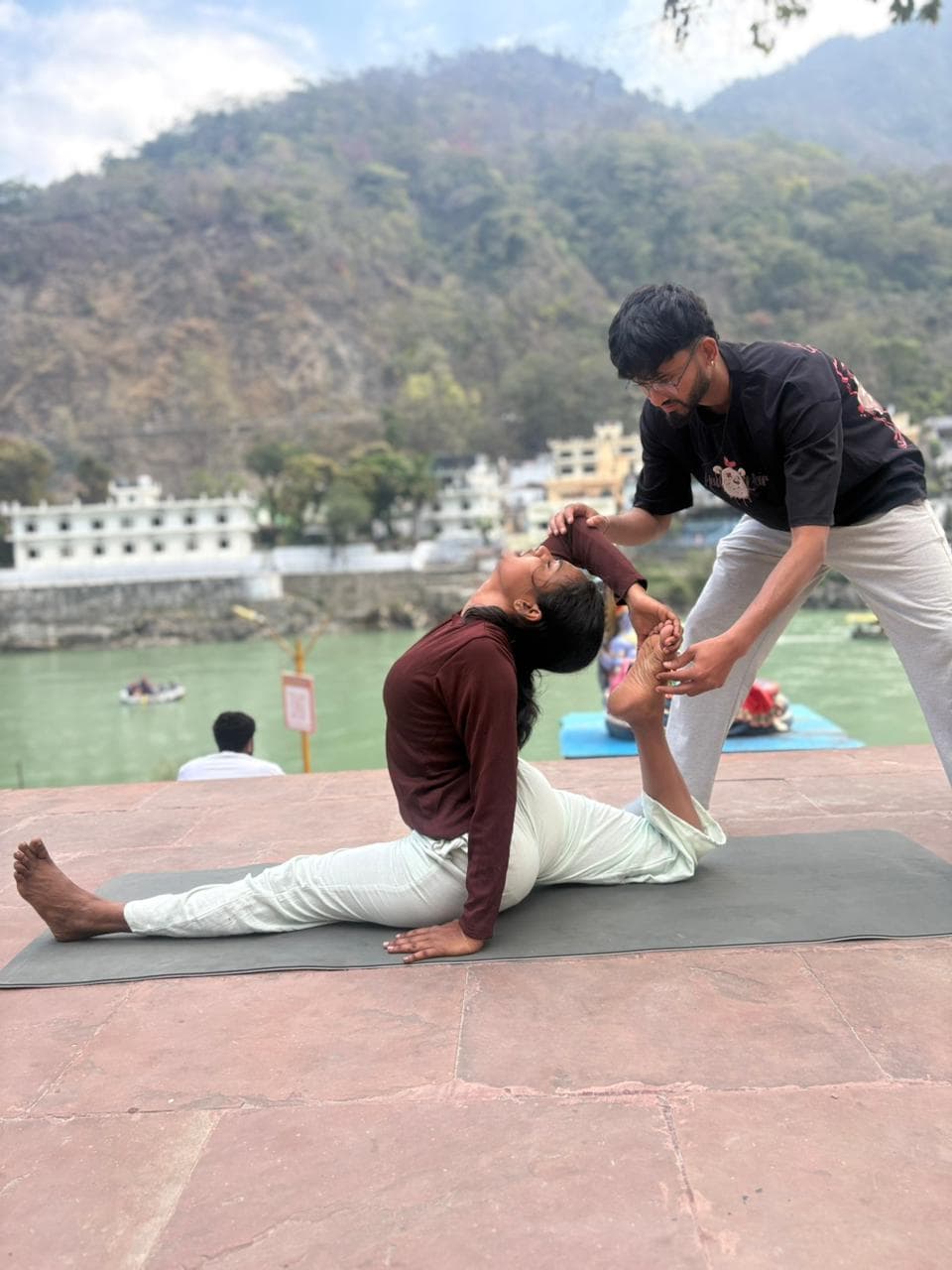 Yoga practice in Rishikesh near Ganga river - Image 1