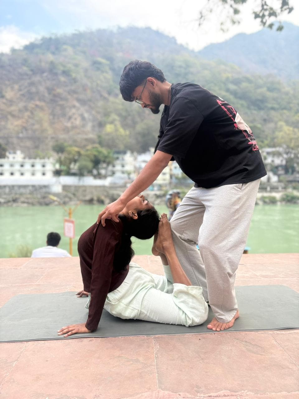 Yoga practice in Rishikesh near Ganga river - Image 2