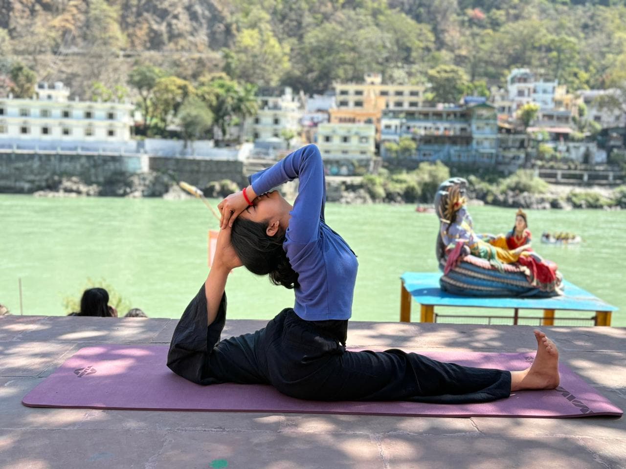 Yoga practice in Rishikesh near Ganga river - Image 2