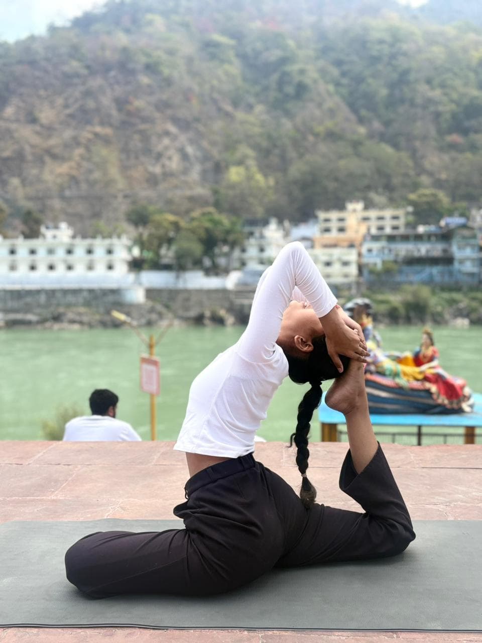 Yoga practice in Rishikesh near Ganga river - Image 7